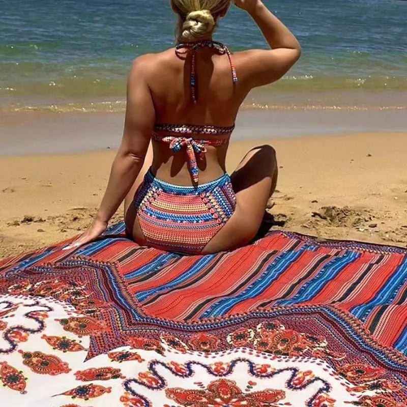 Women's three-piece swimsuit set showing high-waist cutout bottoms, sleeveless top, and coat in matching colour