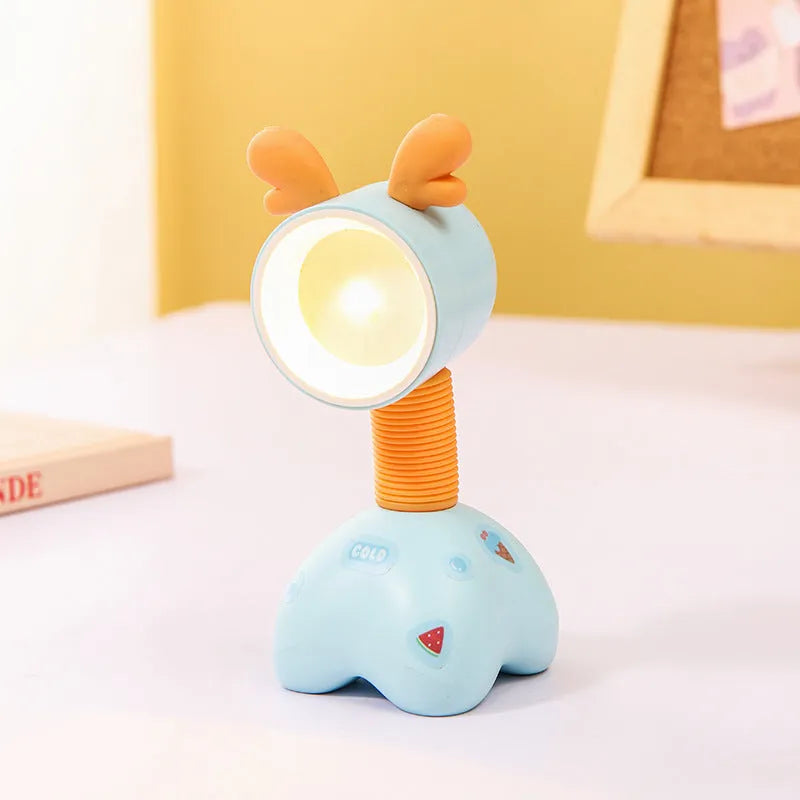 DIY cartoon magnetic small night lamp in assorted animal styles and colours on a desktop.