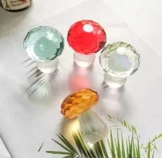 Colourful acrylic mushroom crystal decoration in geometric style, measuring 40mm by 53mm.