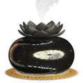 Pure black round Lotus aromatherapy humidifier with USB port and ceramic finish.