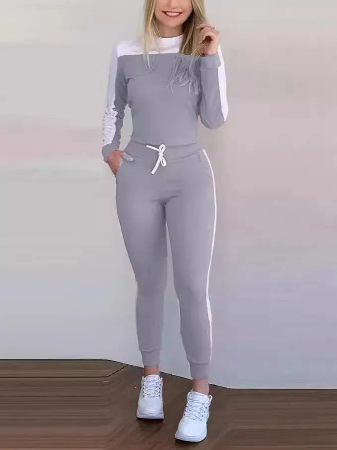 Women's colour-block long sleeve casual suit with pockets, polyester fibre, black colour option, front view on model
