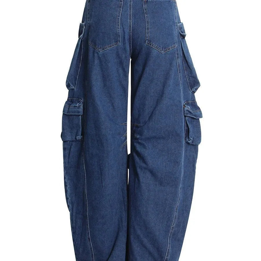 Dark blue distressed women's wide-leg jeans with a high waist and multiple pockets on a mannequin.