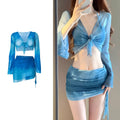 Women's blue four-piece bikini swimsuit set with high-waist briefs and ruffle skirt