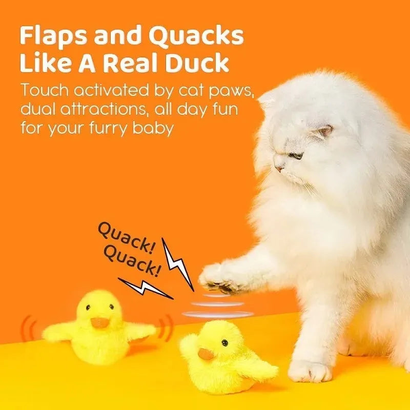 Yellow polyester plush duck cat toy with electric flapping wings on green background
