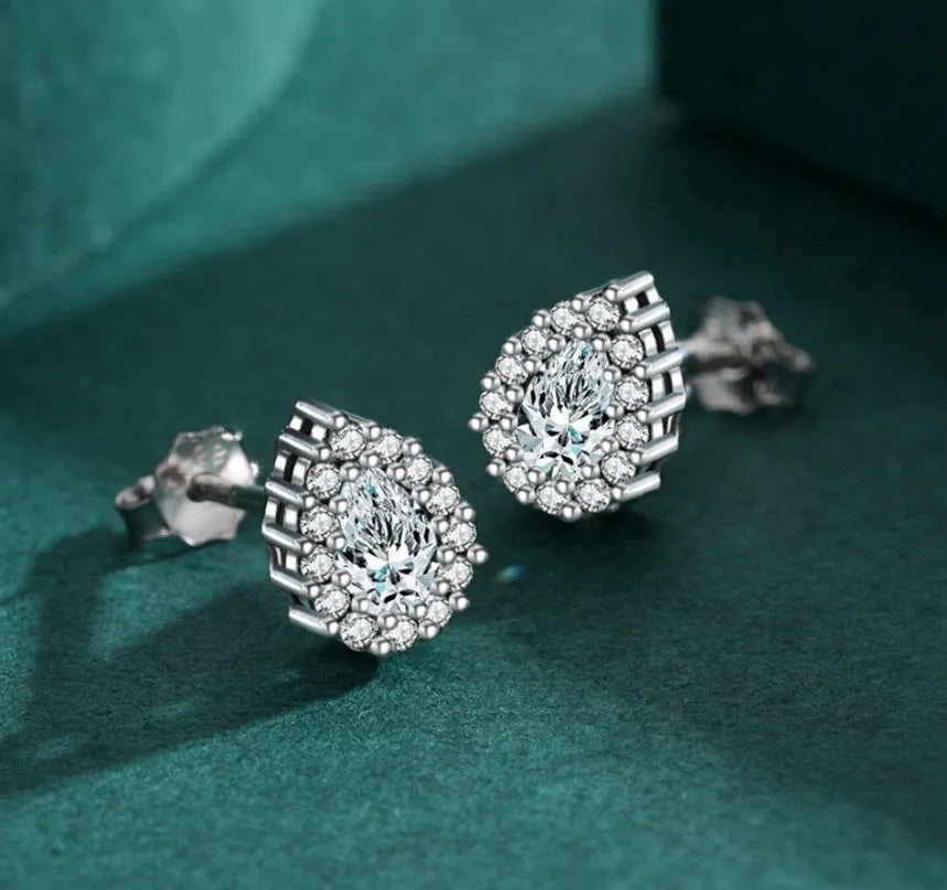 Women's silver water drop ear studs with diamond-cut surface on 925 sterling silver