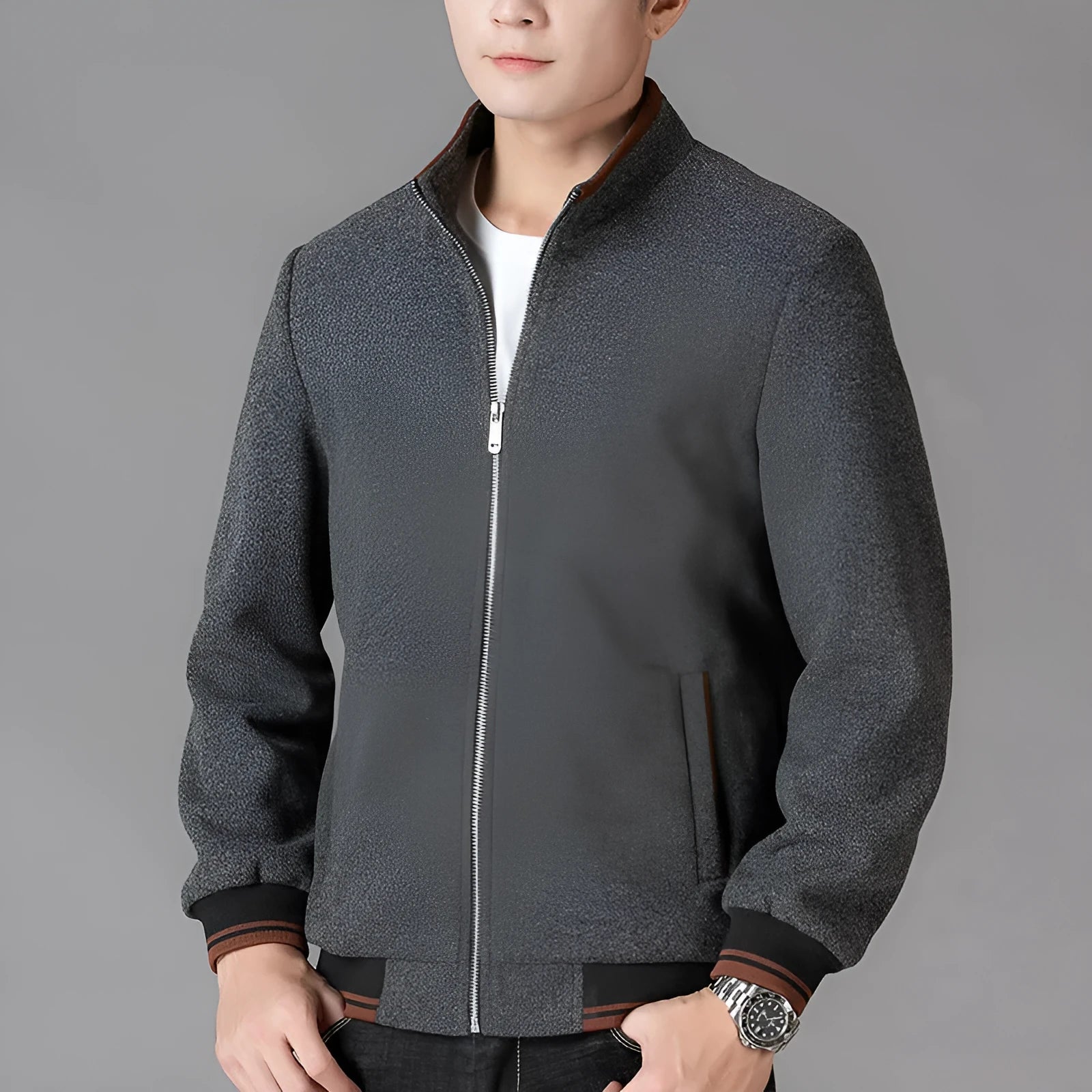 Men's grey sports-style fleece jacket with long sleeves and stick pockets