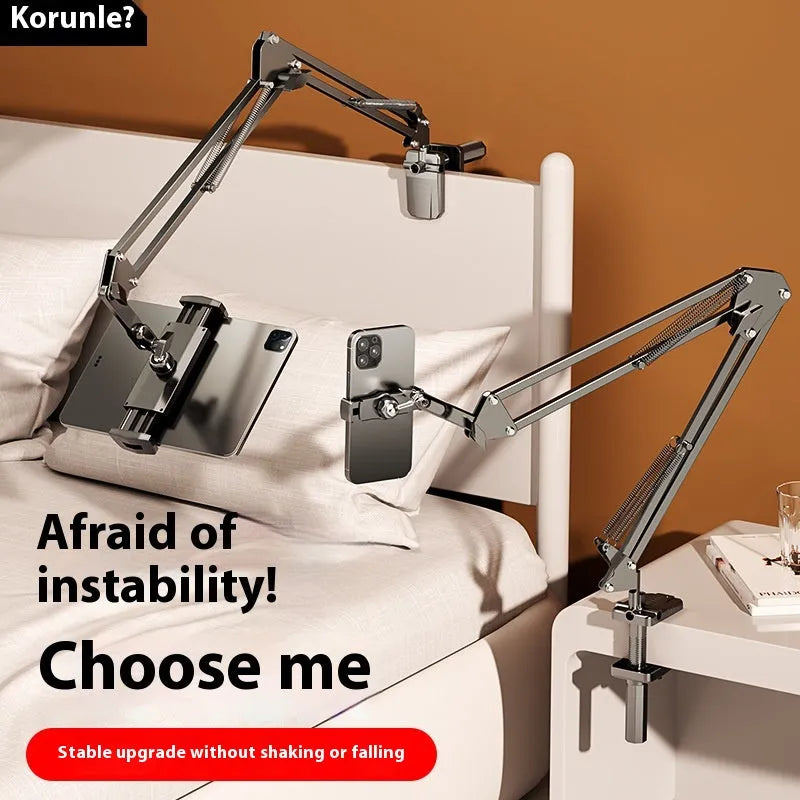 Universal alloy lazy bracket holding a mobile phone on a bedside table
