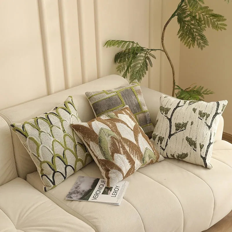 Yarn-dyed jacquard floral pattern cushion cover in 45x45cm size on a grey sofa.