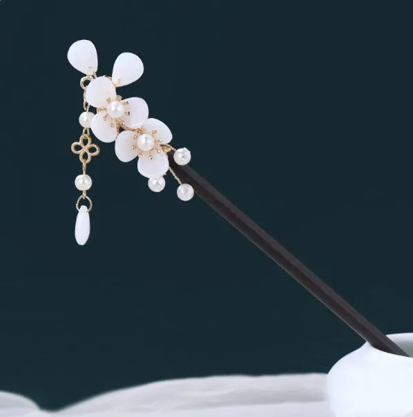 Chinese ancient style floral alloy hairpin with electroplated finish on dark background