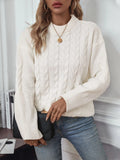 Women's loose casual pullover sweater with twist design in beige colour