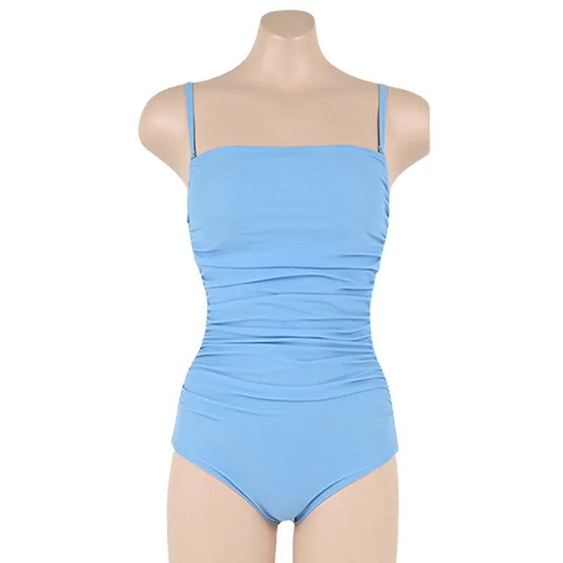 Sling style one-piece swimsuit for women with belly pleats in blue, white, yellow, or black.