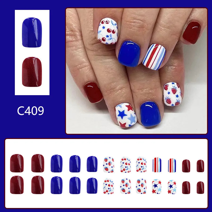 Short glossy red and blue nail stickers with strawberry and cherry pattern, pack of 24.