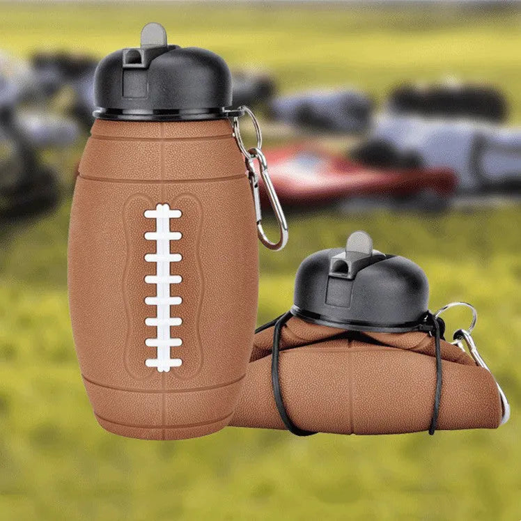 Brown collapsible sports water bottle in rugby ball shape with 600ml capacity and non-slip silicone grip
