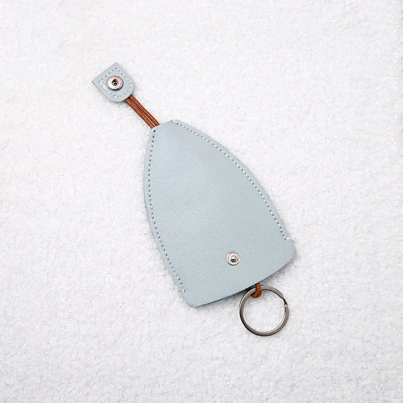 Cartoon design pull-out key case for car keys in PU leather.