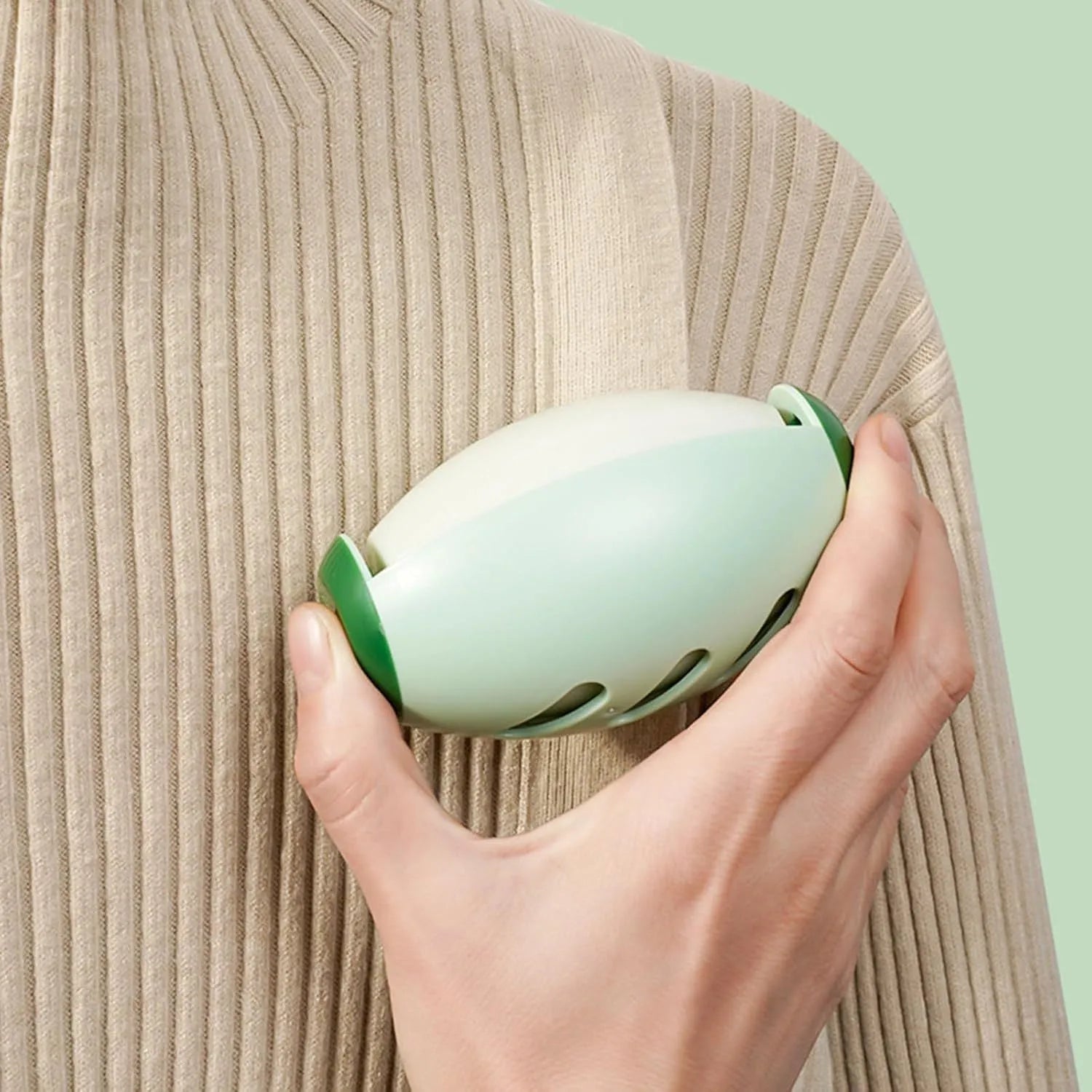 Green and white washable reusable gel lint roller ball for pet hair removal