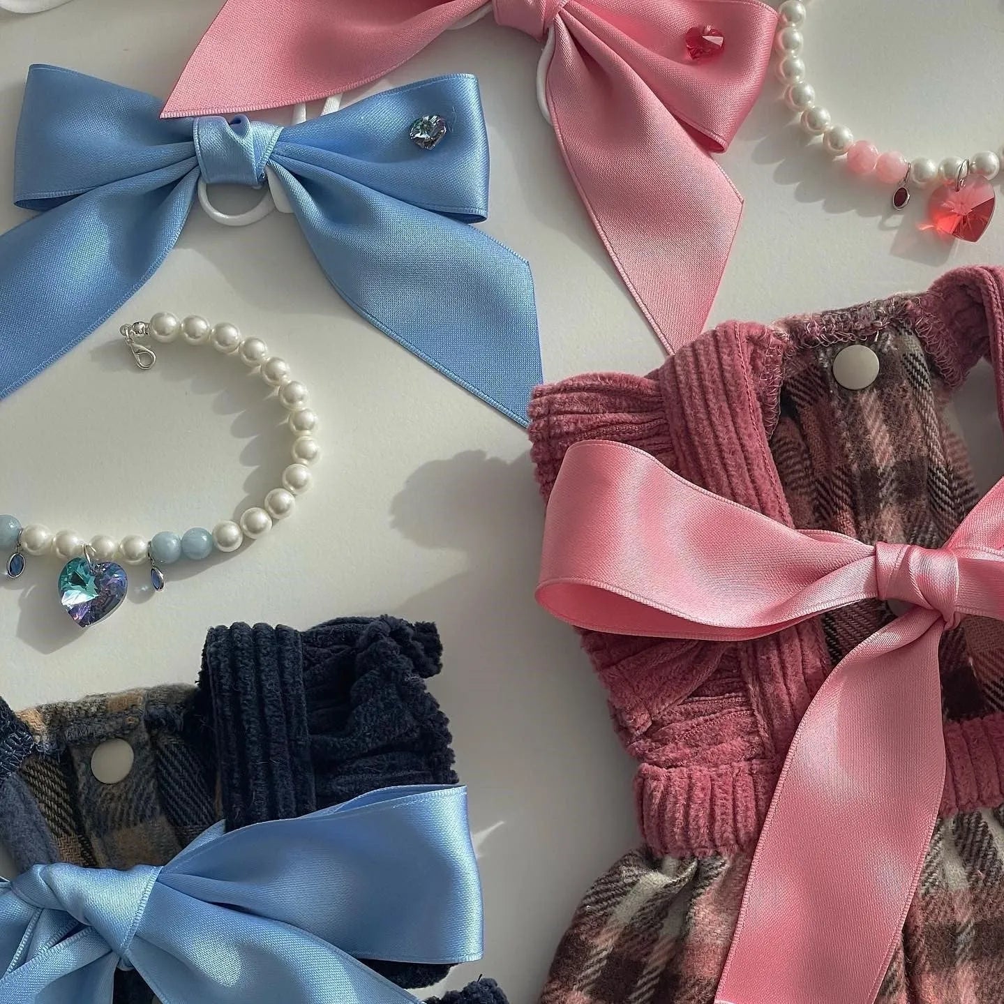 Adjustable dog hair band with princess style bow in blue and pink colours