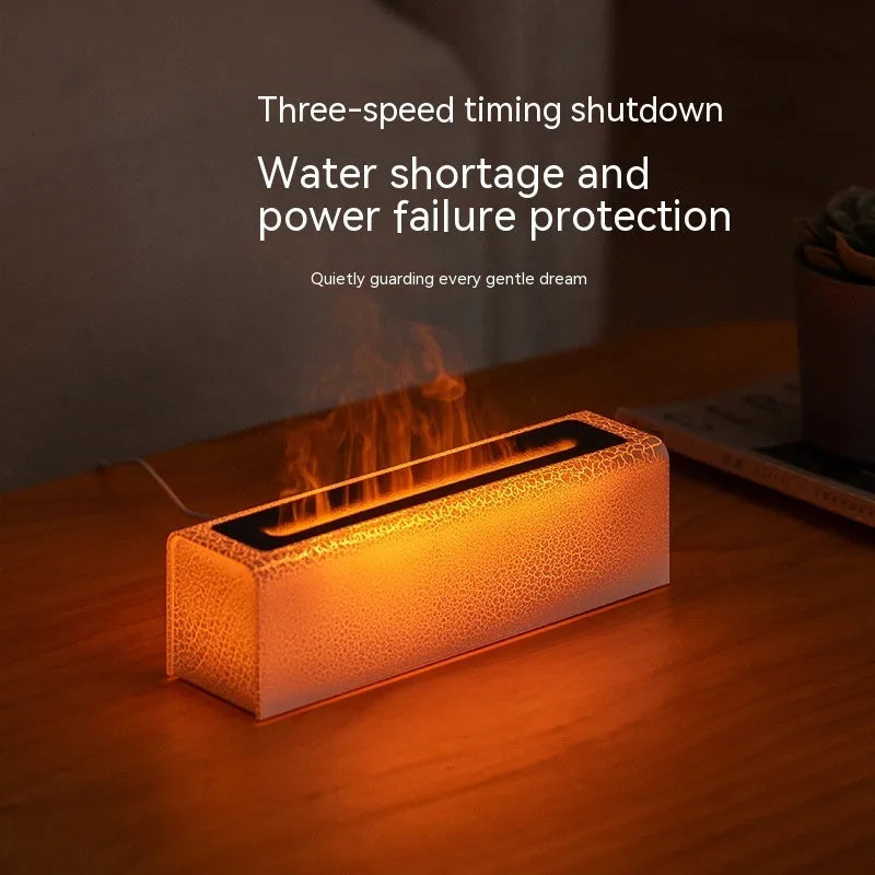 Square black creative lava USB humidifier and aroma diffuser with colourful LED flame lighting on a desk.