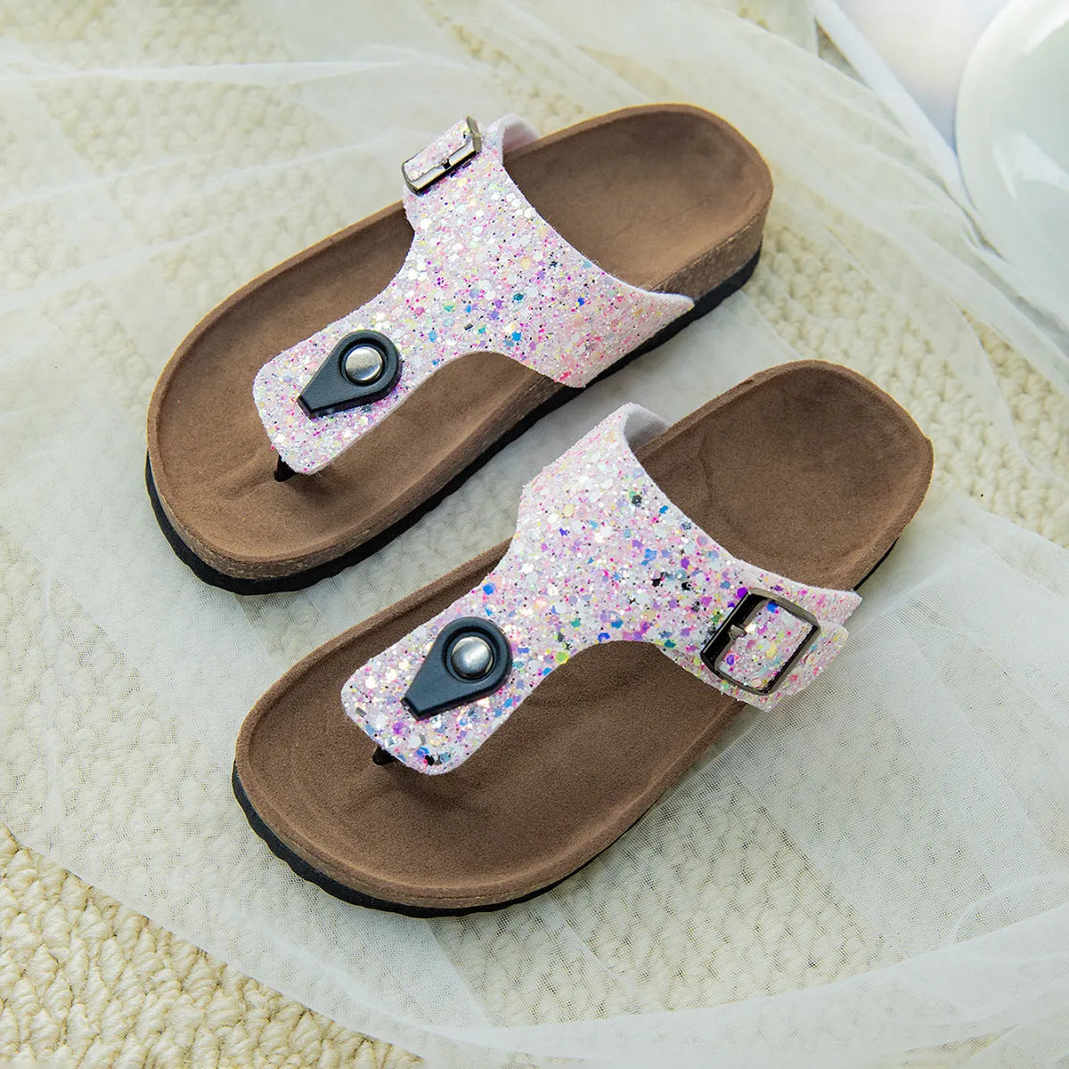 Gold, pink, or silver cork flip-flops with PVC sole and frosted artificial leather upper