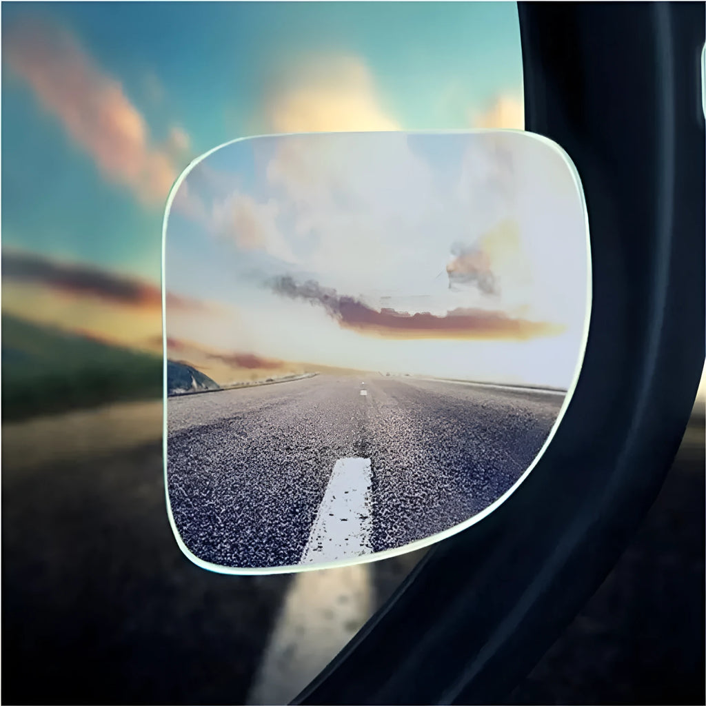 Pair of white, fan-shaped, circular glass blind spot mirrors for cars, shown adjustable.