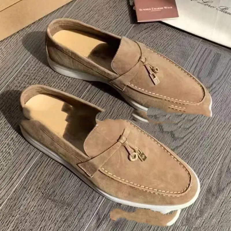 High-top slip-on loafers in various colours with round toe and rubber sole.