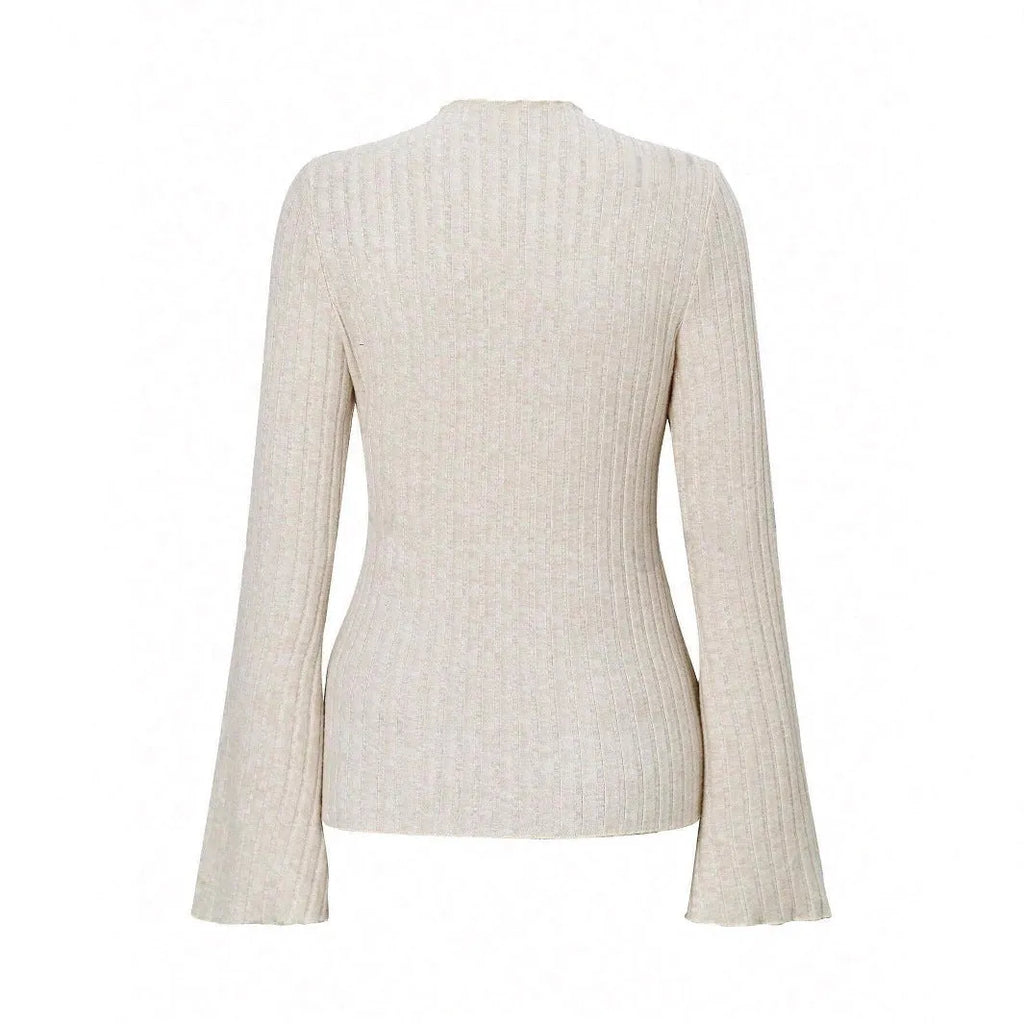 Long sleeve slim fit top with lantern sleeves and sunken stripe pattern in polyester fabric