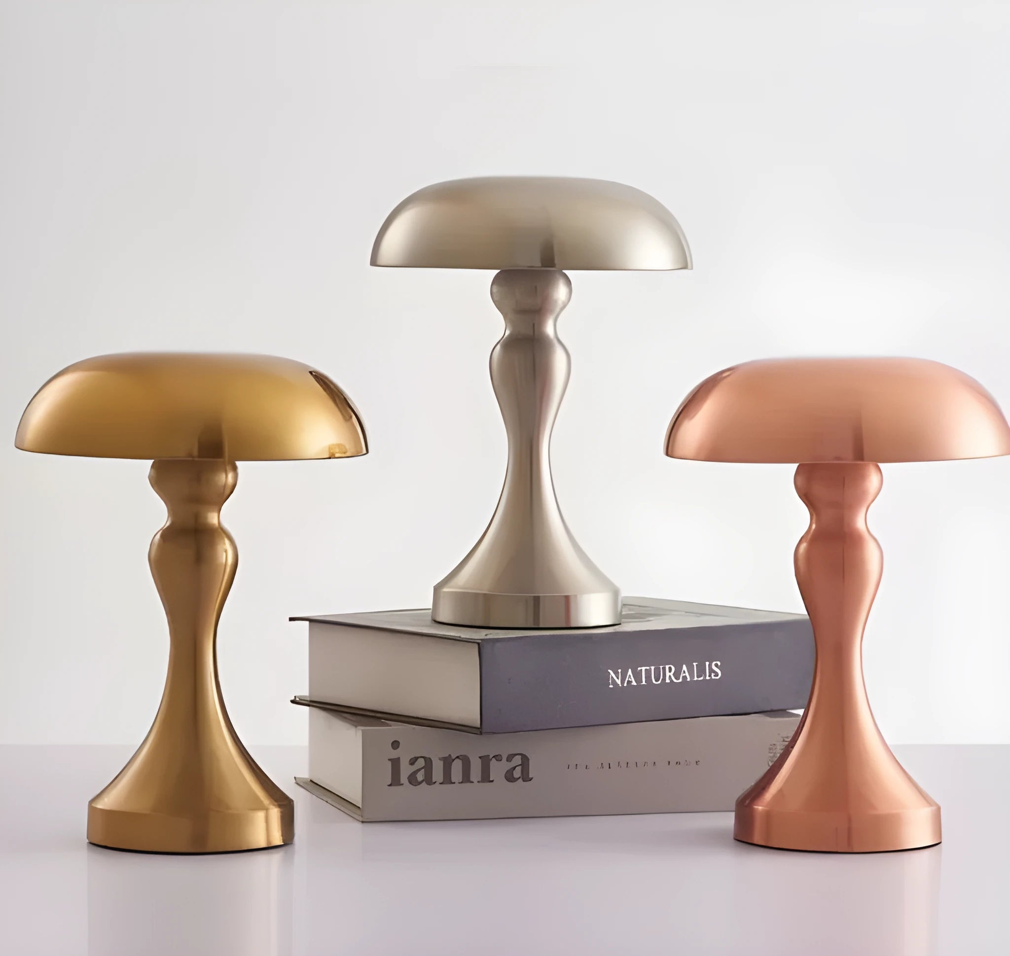 Metallic finish desk lamp with touch control and USB charging cable on a wooden desk