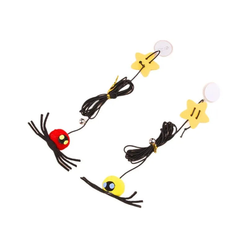 Cat hanging door toy with elastic rope featuring feather, bell and spider attachments in red or yellow colours