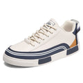 Men's white and green canvas casual shoes with mesh ventilation panels and round toe flat heel design