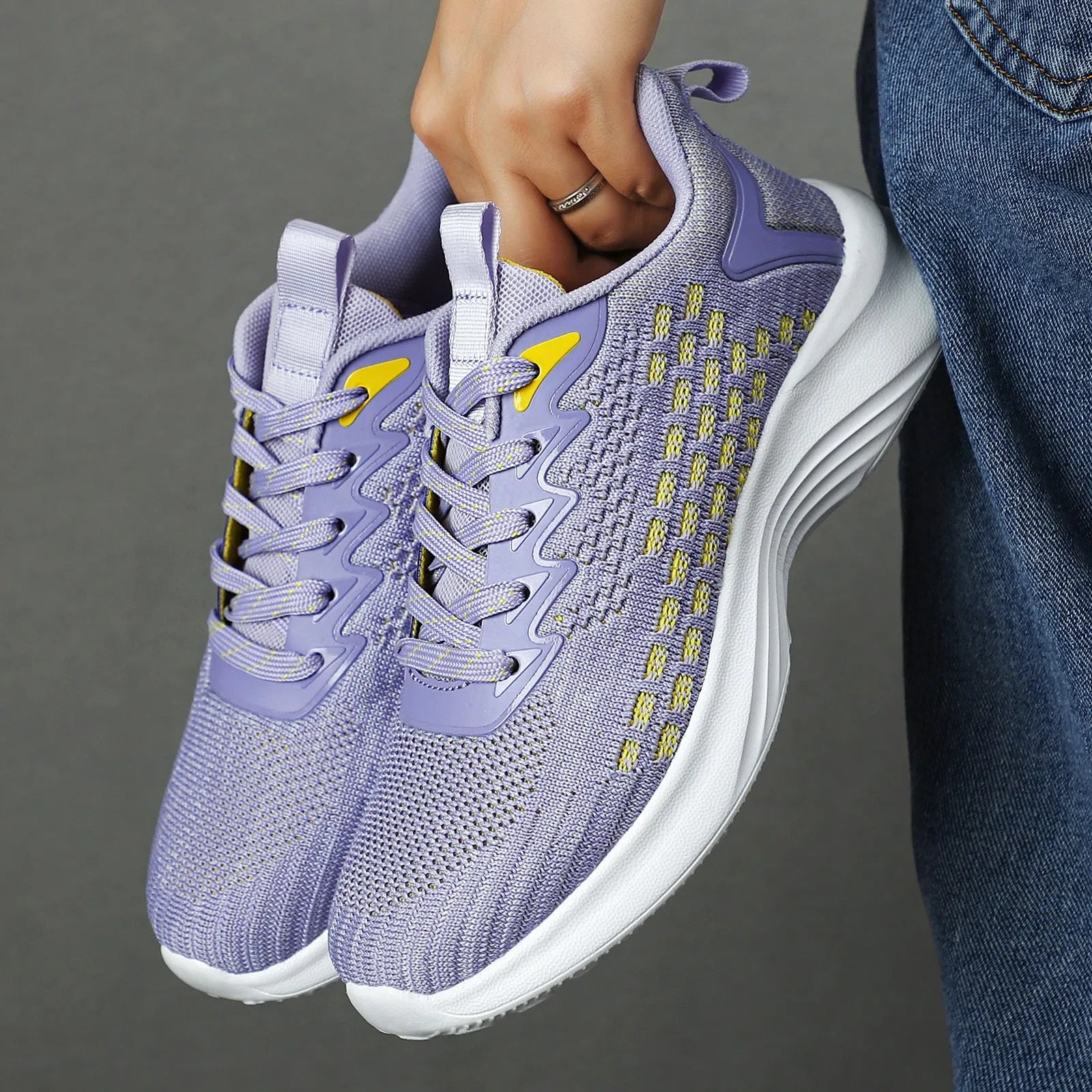 Women's lavender purple Flyknit running shoes with mesh lining and EVA sole for jogging