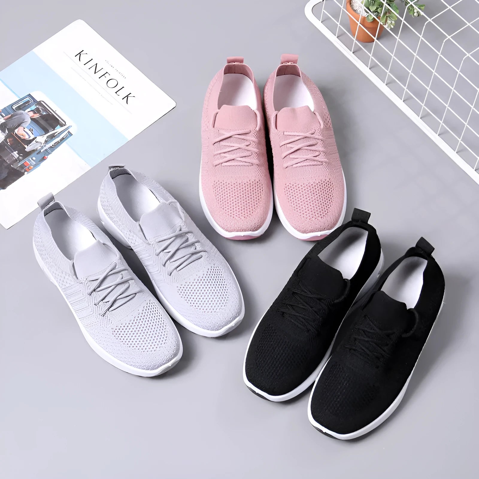 Women's solid colour mesh sneaker with round toe and lace-up front, on a non-slip PVC sole.