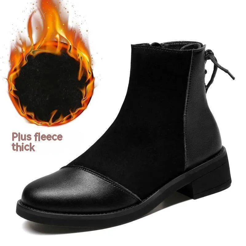 Black women's Martin boots with side zip, round toe, and knee-length shaft