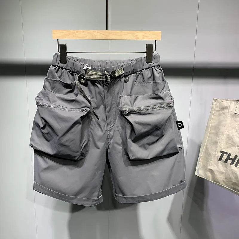 Men's large size work shorts in black or grey with loose pockets and straight leg hem