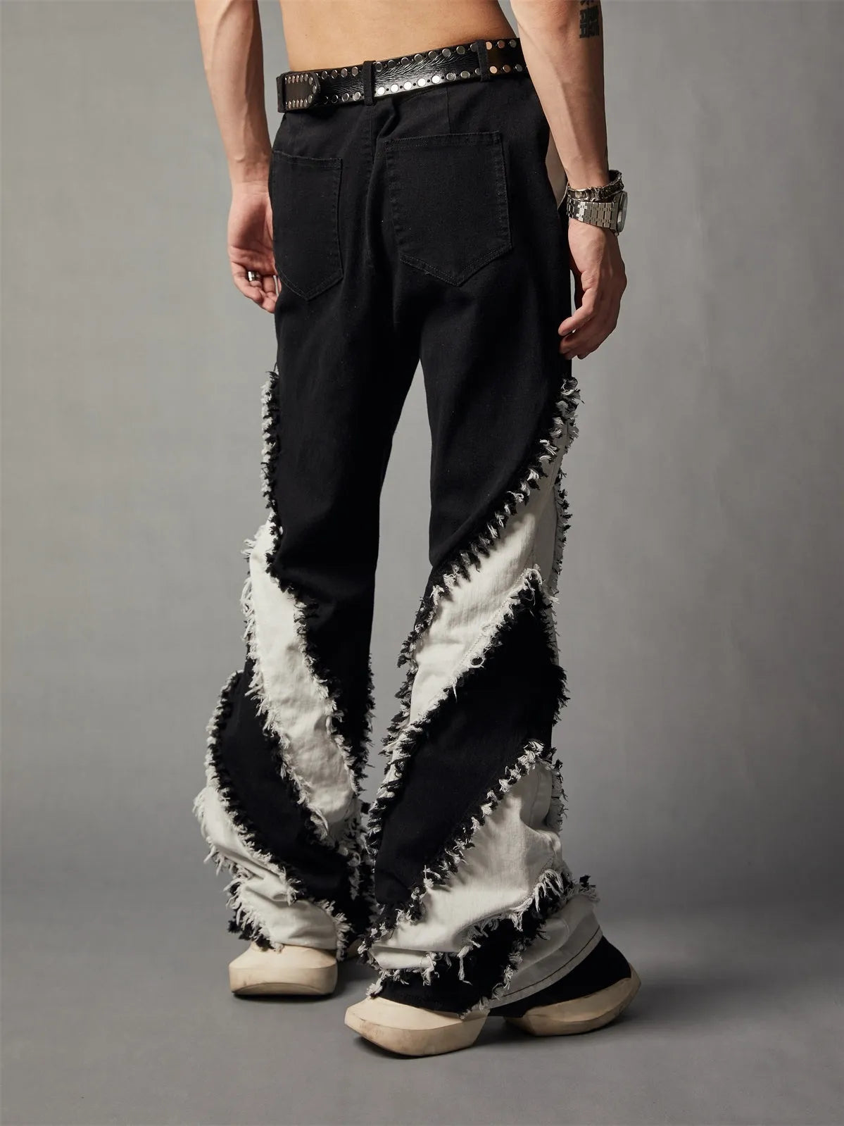 Black white patchwork slim fit rough edge washed jeans with mid waist and zip fly