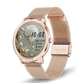 Women's smart watch with touch screen on a silver stainless steel mesh wristband.
