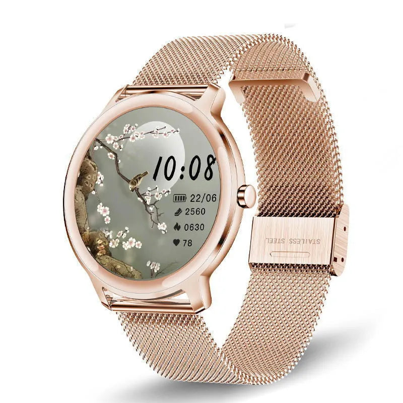Women's smart watch with touch screen on a silver stainless steel mesh wristband.