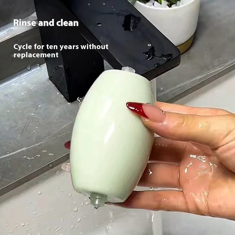 Washable plastic hair collector roller in green for removing lint and pet hair from fabrics