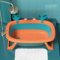 Foldable blue portable pet bath tub with removable centrepiece for small dogs and cats.