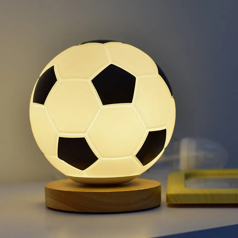 Football LED small glass night lamp with black and white football design on bedside table, USB powered, remote controlled