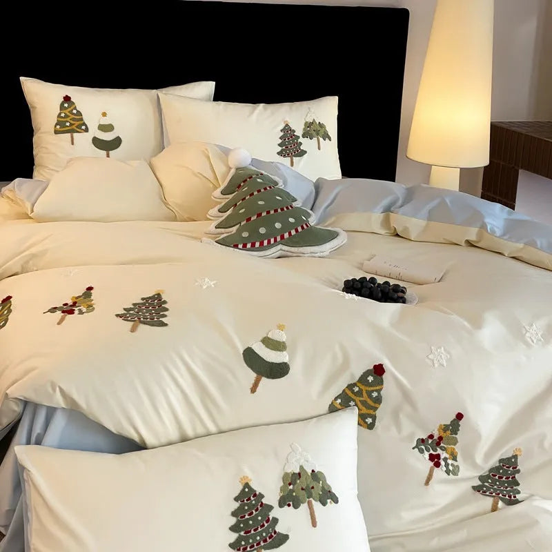 Pure cotton four-piece bedding set with embroidered Christmas tree and towel pattern in cream blue or green.