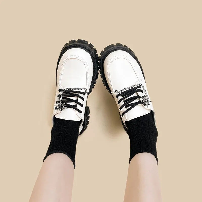 Women's preppy style loafers with metal cross-strap in Duke Asterism colour
