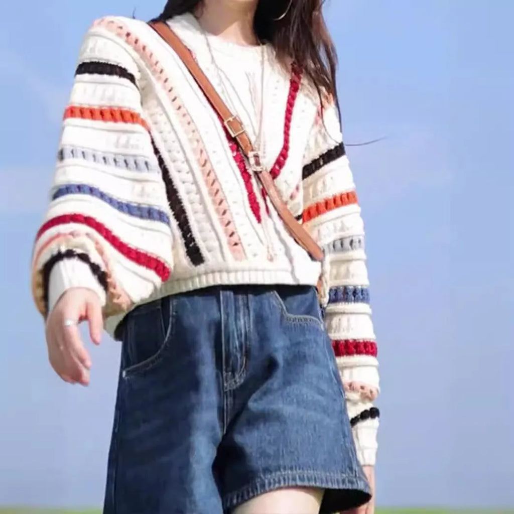 Colourful rainbow striped loose fit pullover sweater with batwing sleeves and hollow knit texture