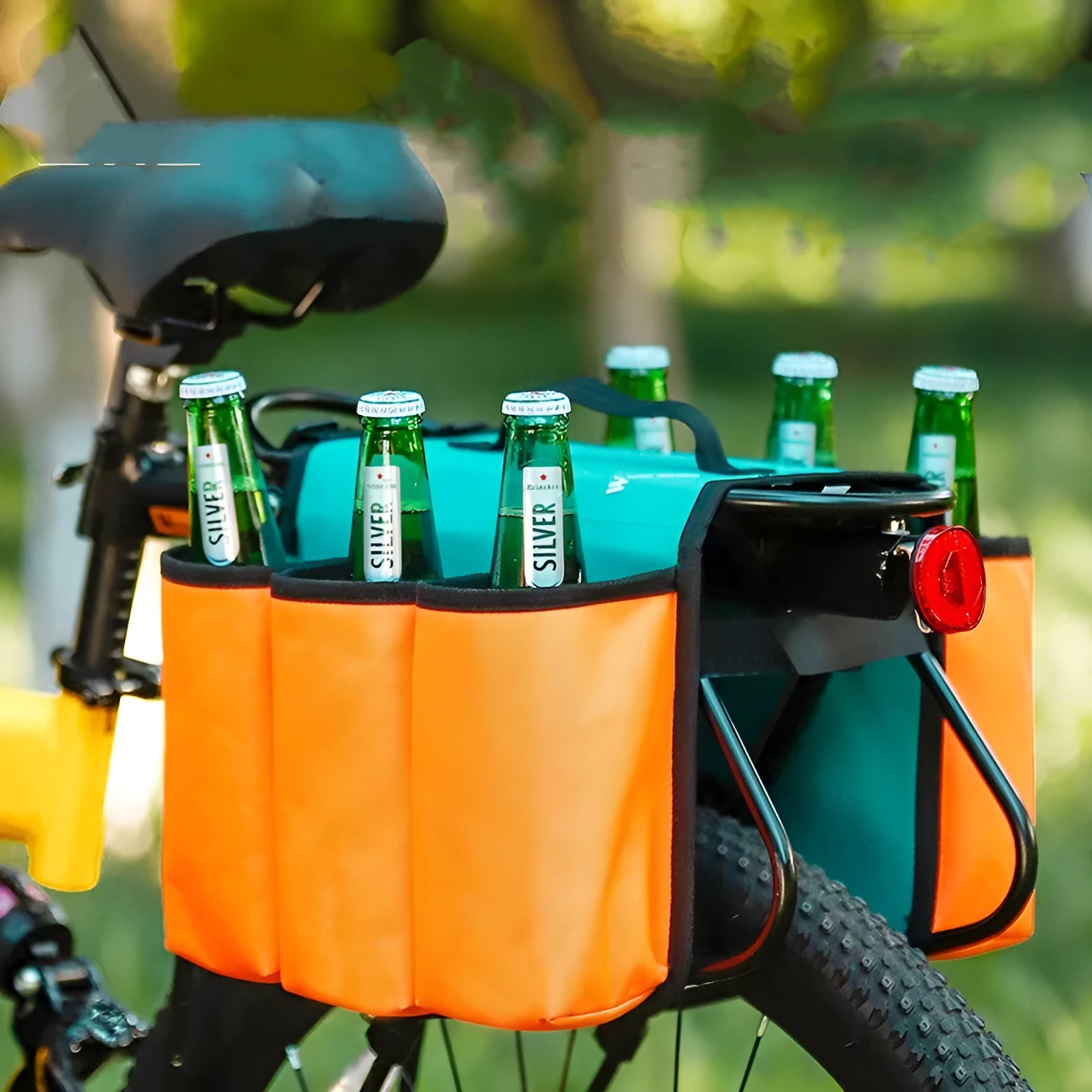 Black and orange bicycle double-sided drink shelf bag mounted on bike rack with 2 litre capacity