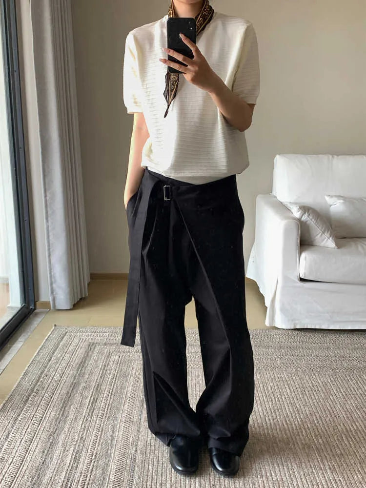 Black straight-leg trousers with a single pleat and adjustable waistband on a neutral background.