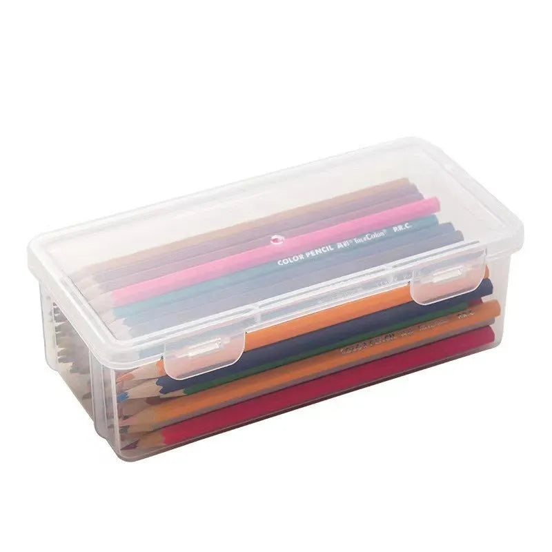 Clear plastic pencil storage box with large capacity for organising stationery and children's art supplies.