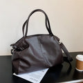 Large PU leather messenger bag with adjustable shoulder strap showing interior phone pocket organisation