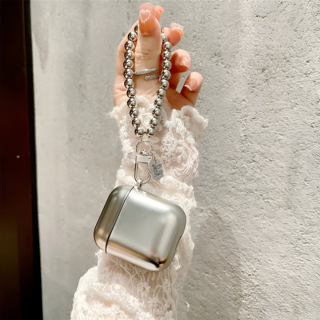 Matte plating protective case for AirPods with integrated bracelet showing electroplated finish