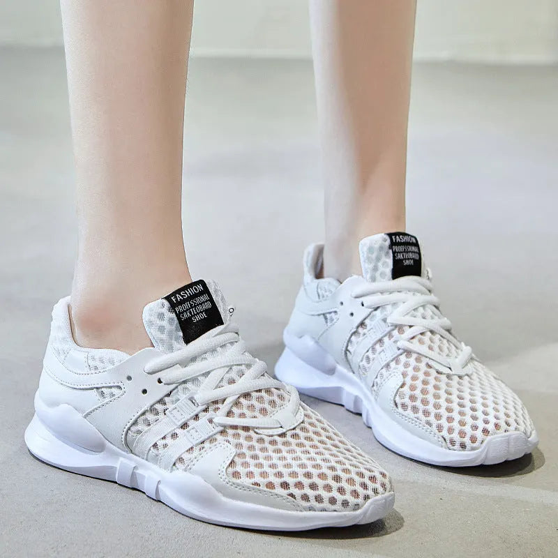 Breathable hollow-out mesh sneakers in black on a white background.