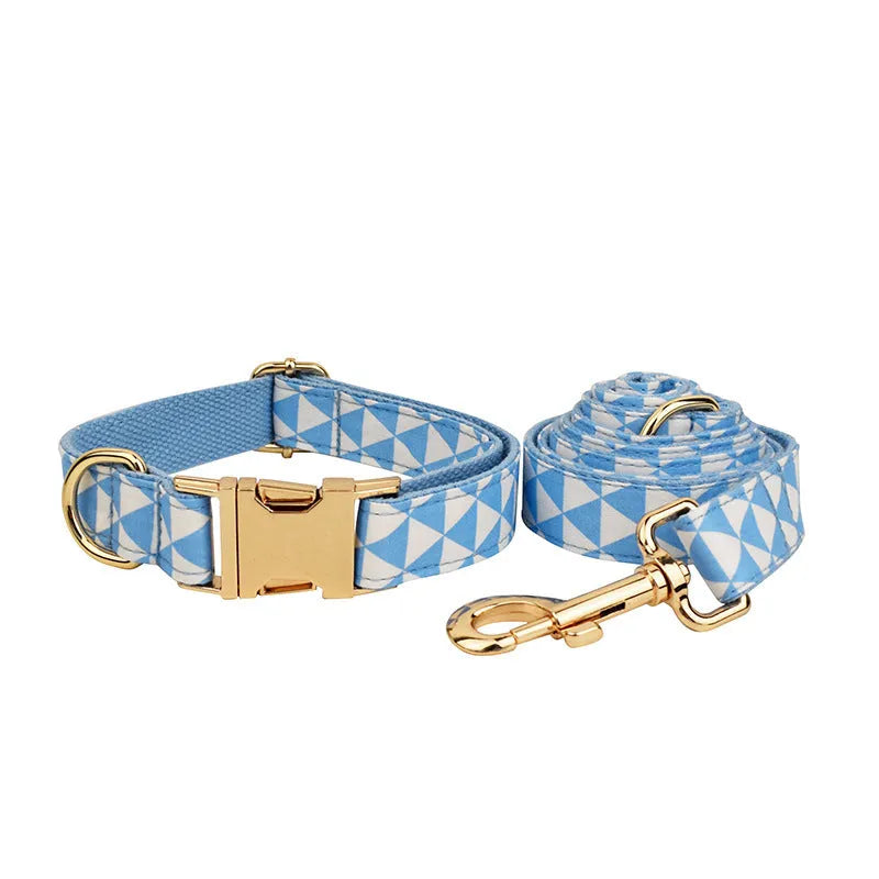 Blue cloth dog collar, leash, bow, and vest four-piece pet accessory set with triangular ring rope design.