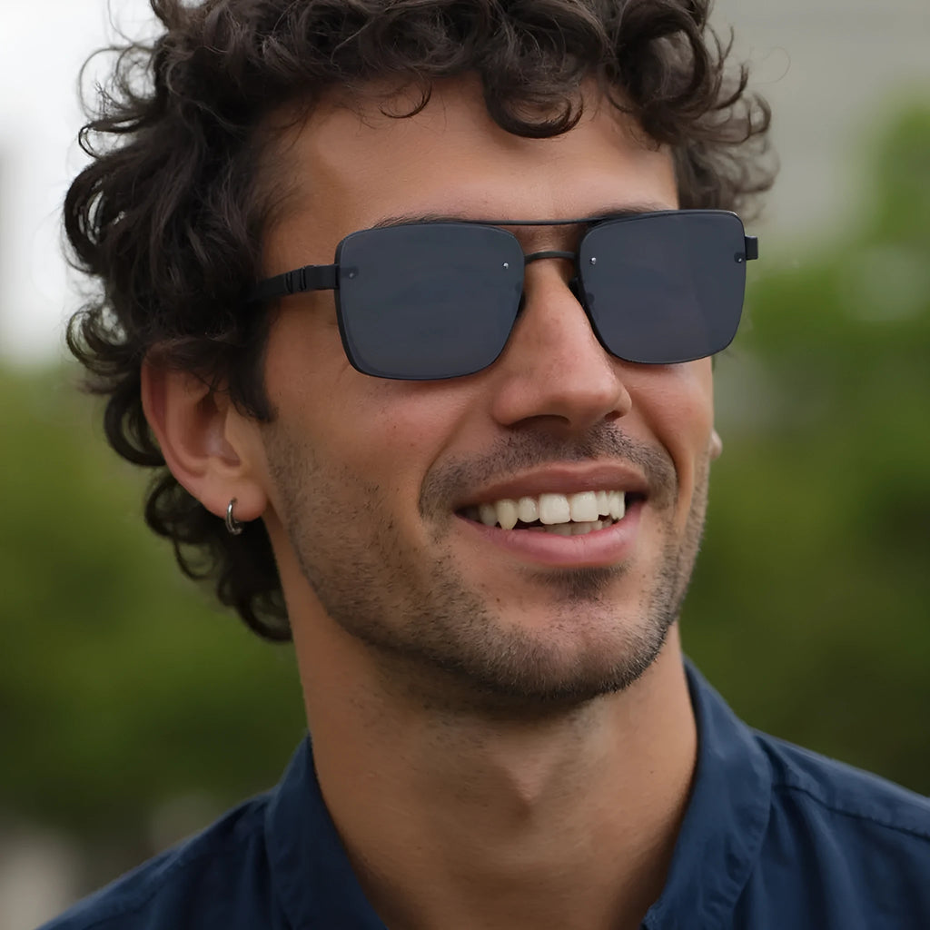 Men's vintage sunglasses with gold frame and gray lenses in European style design.