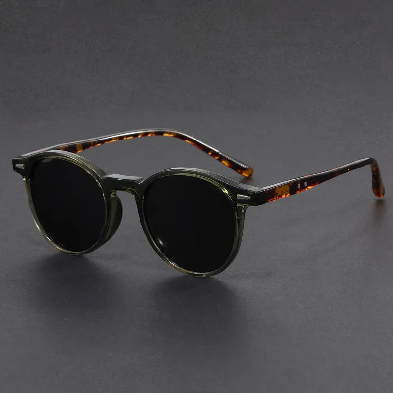 Retro sunglasses with round frame and polarised grey lenses in multiple colour options